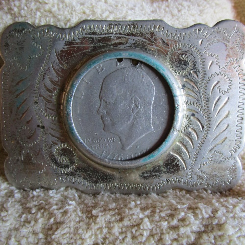 Silver Belt Buckle with a Silver Dollar